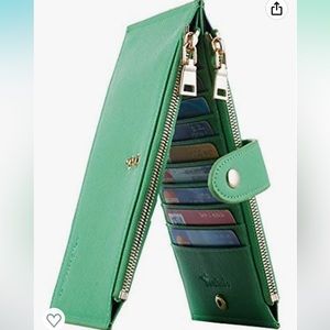 Travelambo green and gold bifold multi card wallet with zipper pockets. NWOT